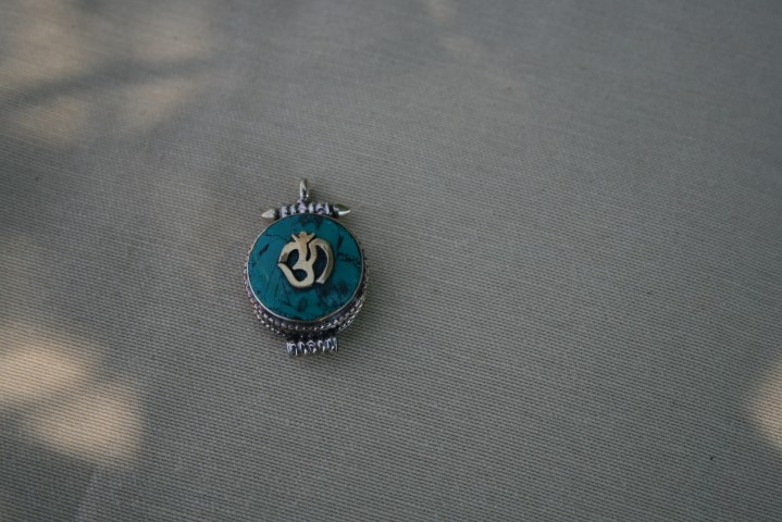 Turquoise Om from Tibet helps clear the mind 4268